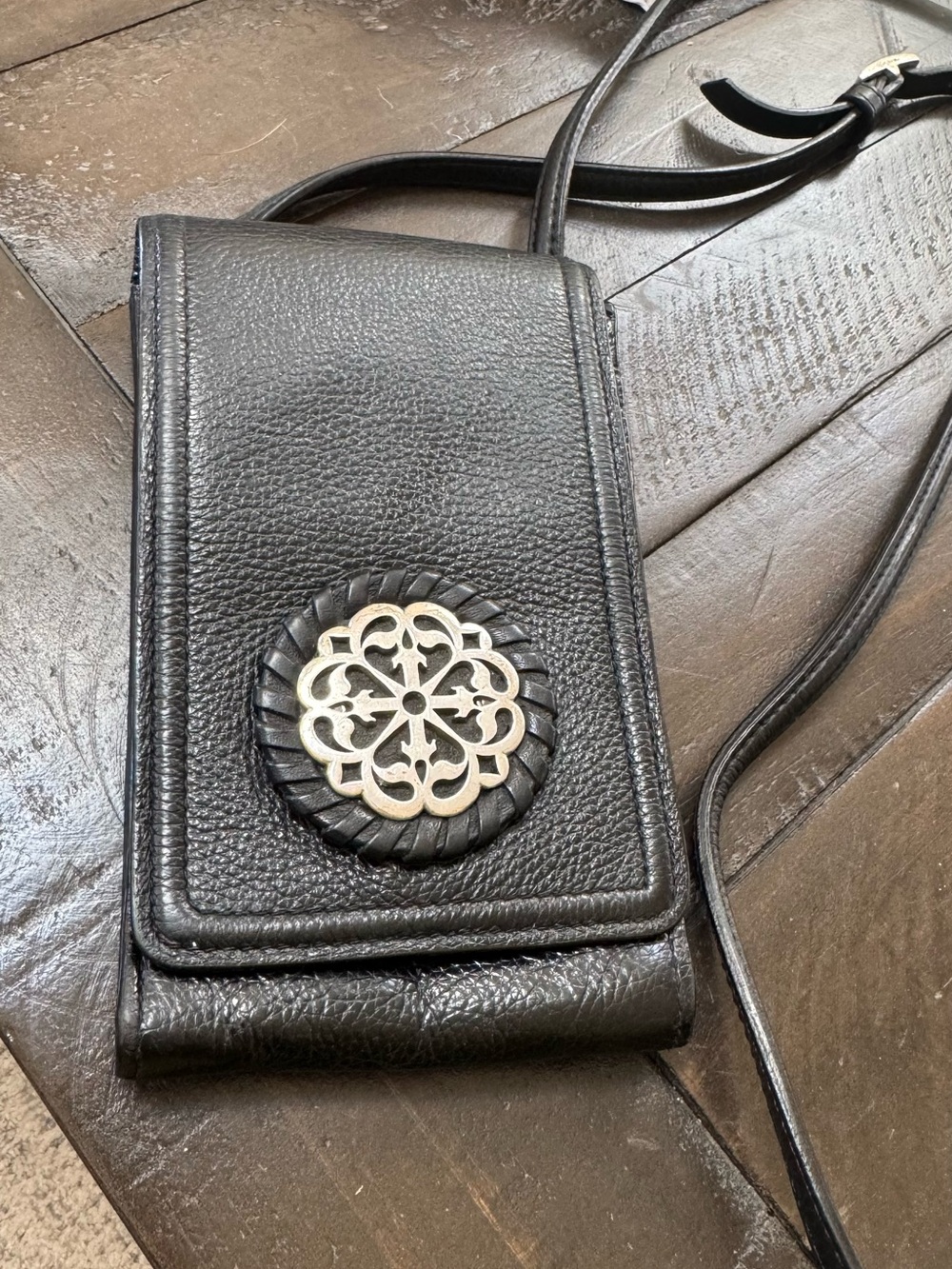 Brighton Ferrara Black Leather Crossbody Phone Bag with Decorative Medallion